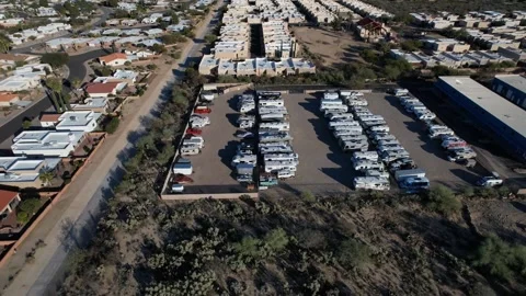Aerial pullback of a storage lot for recreational vehicles Stock Footage 202279628