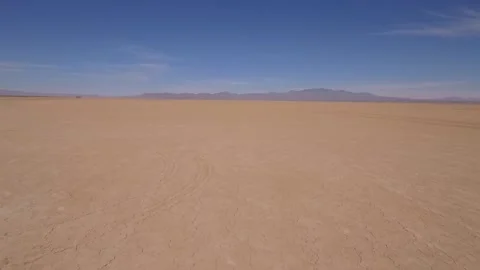 Aerial pullback of a vast dry desert lake Stock Footage 151610125