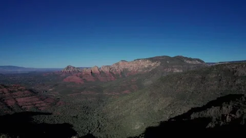Aerial pullback of a vast scenic canyon in Arizona Stock Footage 252394153