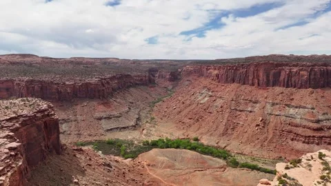 Aerial-Pullback- View of Kane Creek canyon from high desert overlook Stock Footage 273534624