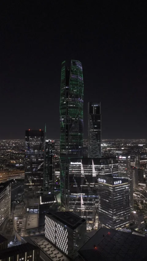 Aerial Pullback View of King Abdullah Financial District at Night in Riyadh Stock Footage 345046205