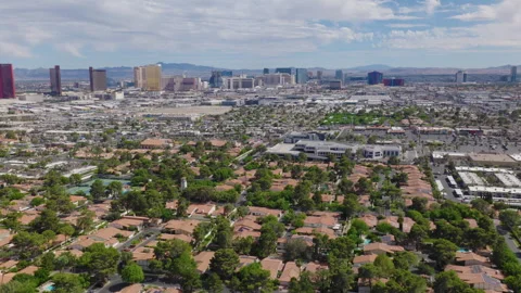 Aerial pullback view of Las Vegas Strip hotels and downtown Vegas skyline Stock-Footage 333484366