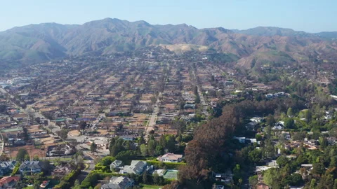 Aerial pullback view of Pacific Palisades and Los Angeles California Stock Footage 308185446