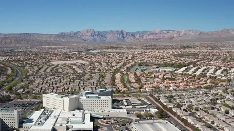 Aerial pullback view of Summerlin Las Vegas community and commercial buildings Stock Footage 271305092