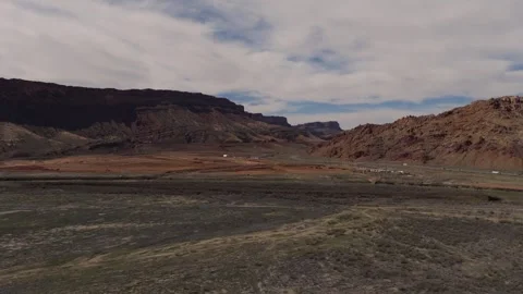 Aerial Pullback View of US 191 Near Moab, Utah Looking Toward Arches National Stock Footage 333301586