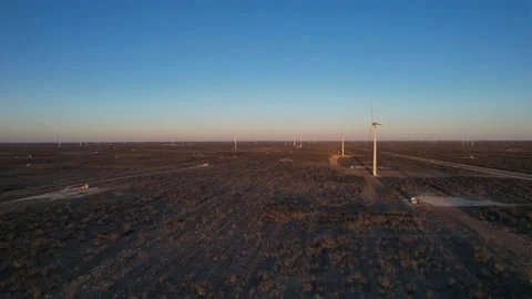 Aerial pullback of wind turbines on the Texas Prairie Stock-Footage 172171961