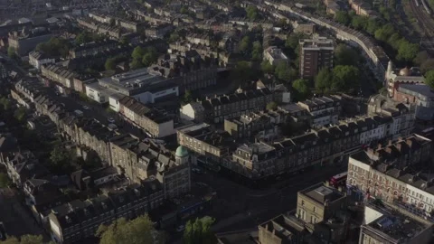 Aerial pulling back over urban residential North London streets and houses with Stock Footage 284248284