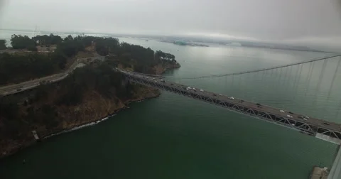 Aerial pulling back to reveal the Bay Bridge Stock-Footage 66363046