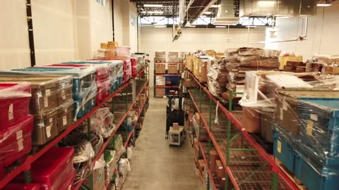 Aerial Pulling Back Through Walls of Shelves Inside Warehouse With No People Stock-Footage 143760002