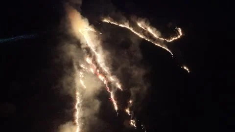 Aerial pullout over brush fire at night Stock Footage 332365422