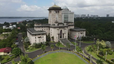 Aerial pulls away from Sultan Ibrahim Building in Johor Bahru Malaysia Stock Footage 237521483