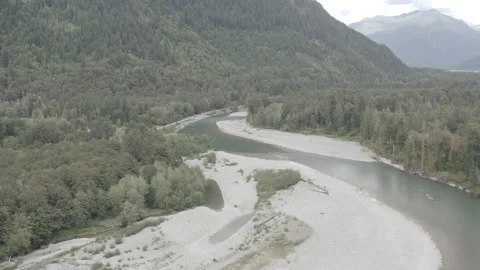 Aerial pulls back over the Skagit River by North Cascades National Park Stock Footage 345182970