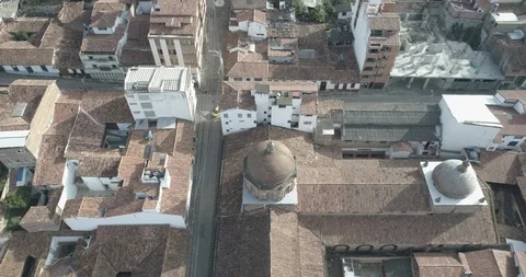 Aerial pulls back over the top of the main church in San Gil, Colombia Stock-Footage 95590877