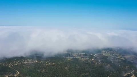 Aerial push in above clouds to reveal stunning cloudscape Stock Footage 119570565