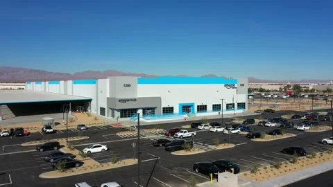 Aerial push in on Amazon Hub Warehouse Stock Footage 153945856