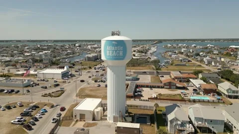 Aerial push in and pull out Atlantic Beach water tower Stock Footage 199686714