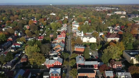 Aerial push in down Main street in Shepherdstown, WV on an autumn morning. Stock Footage 141774516