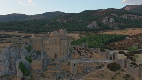 Aerial push in flying over medieval Loarre Castle in Huesca Spain Stock Footage 345093503