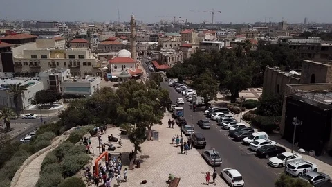 Aerial Push Looking Down on Jaffa Busy City with Cars Driving - Tel Aviv, Israel Видео 95293418