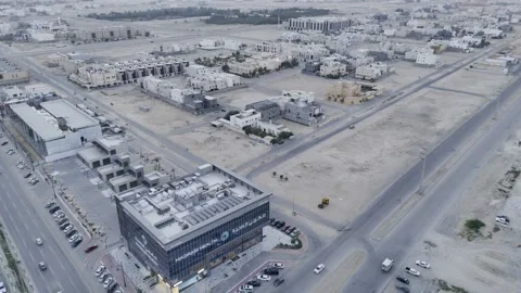 Aerial Push-In Orbit Over Residential Area in Al Ahsa, Saudi Arabia Stock Footage 341765735
