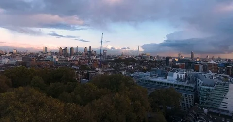 Aerial push out view of the City of London at sunset Stock Footage 69806967