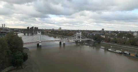 Aerial push out view of the Royal Albert bridge over the river Thames in London Stock Footage 69806819