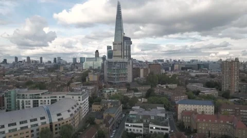 Aerial push out view of the skyline of the City of London Stock Footage 68985206
