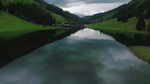 Aerial Push In Over Calm Mountain Lake in Austrian Countryside Stock Footage 337109552