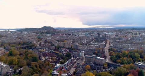 Aerial push in over Edinburgh and the Dean Village heading towards Stock Footage 256981014