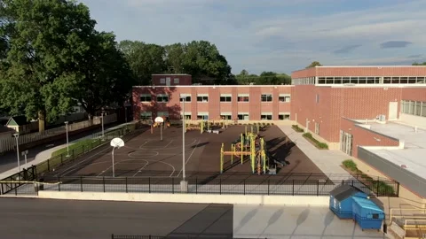 Aerial push-in on public school playground in United States, American Stock Footage 137486896