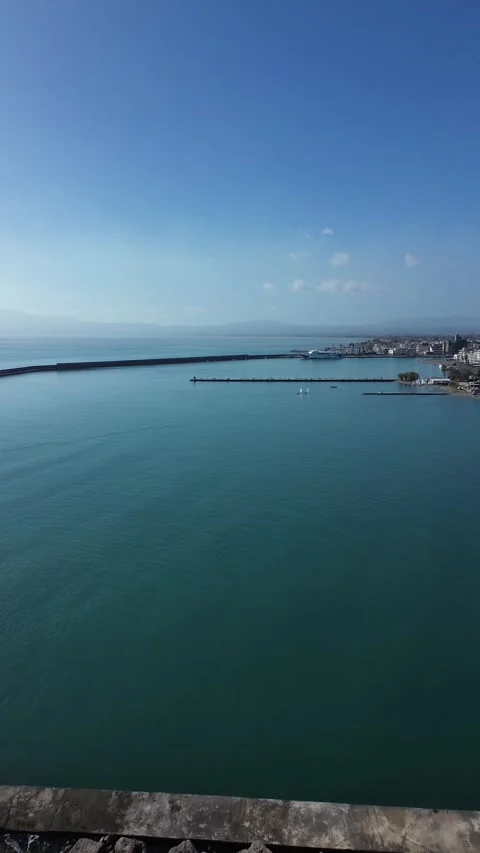Aerial , push in, right pan vertical footage, showcasing Kalamata's port and 스톡 동영상 332626925