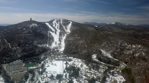 Aerial Push into Sugar Mountain Ski Resort Stock Footage 125787997