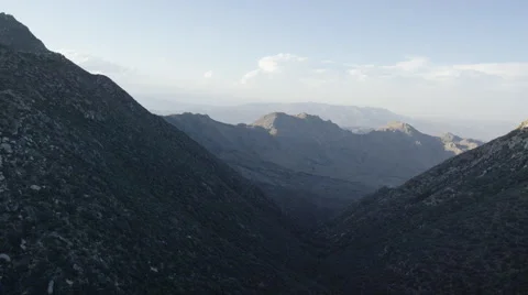 Aerial Push Through Mountain Valley Stock Footage 59102321