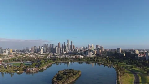 Aerial Push In Toward Melbourne CBD Skyline Across Albert Park Lake Stock Footage 325683563