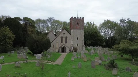 Aerial Push In Towards All Saints Church in Catherington, Hampshire. England Video stock 325187783