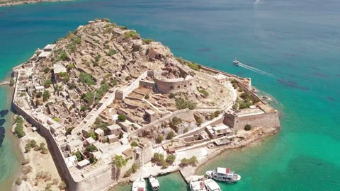 Aerial push in view of Spinalonga fortress island and turquoise sea Stock Footage 337046280