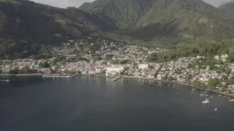 Aerial pushes down and over the town of Soufriere, Saint Lucia Vídeos de archivo 209655004