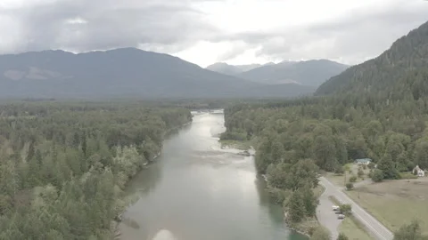 Aerial pushes downstream of the Skagit River in Washington Stock Footage 345183232