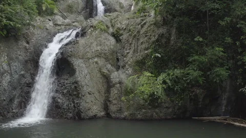 Aerial pushes up from the lower pool to second waterfall in Argyle Falls, Tobago Stock Footage 340852230