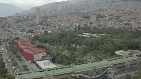 Aerial pushes over Parque Explora towards Jardin Botanico in Medellin, Colombia Stock-Footage 105721879