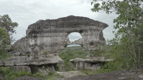 Aerial pushes through gate of Puerta de Orion rock formation in Guaviare Video stock 109181991