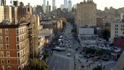 Aerial pushing forward over 6th ave traffic and cars Manhattan New York City NYC Stock Footage 119555431
