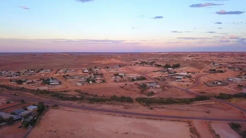 Aerial pushing in to the opal mining town of Coober Pedy, Austrailia Stock Footage 108757946