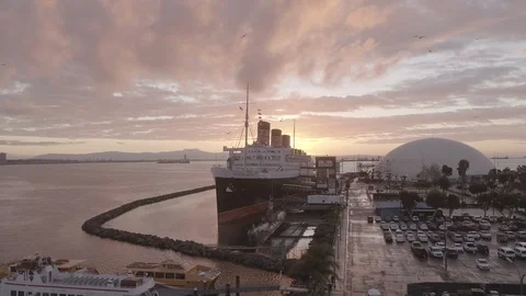 Aerial Queen Mary at sunrise in Long Beach Stock Footage