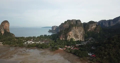 Aerial Railay Beach Pan to Citty with low tide in Philippines / 4K Drone Stock Footage 108459936
