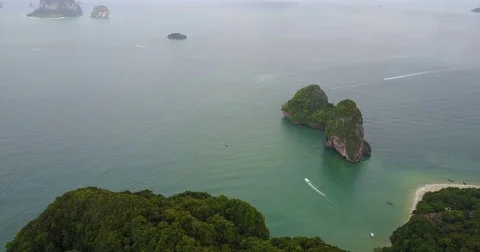 Aerial Railay Mountain flyover Reverse Stock Footage 80241357