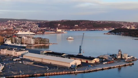 Aerial real time approaching shot of a ferry boar near Aker Brygge and Filipstad Stock Footage 105247249