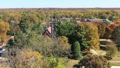 Aerial rear view of the tower, chapel, on Cumberland Plateau mountain on a  autu Stock Footage 219836722