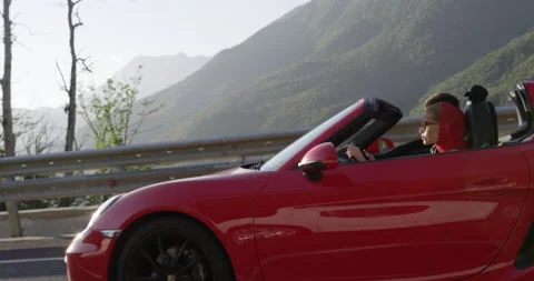 Aerial: Red Convertible Driving On Empty Road In Sunny Nature. 46 Video stock 159350661