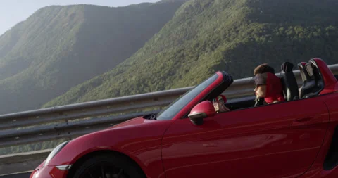 Aerial: Red Convertible Driving On Empty Road In Sunny Nature. 49 Video stock 159351104